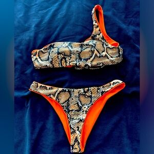 SHEIN reversible swimsuit! Snakeskin on one side and bright orange on the other!